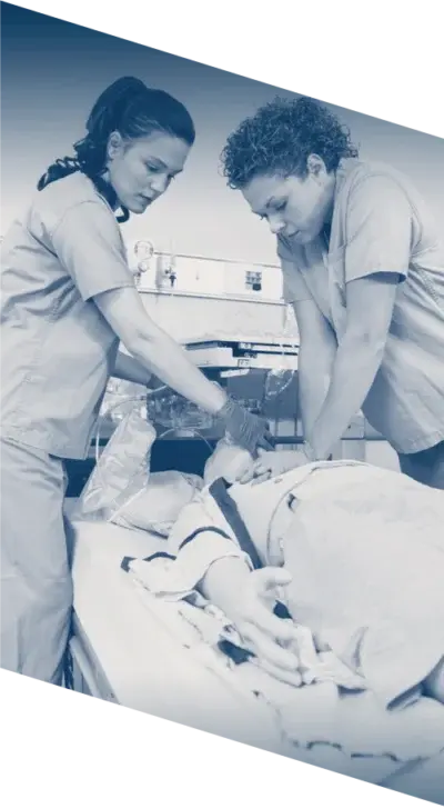 Nursing professionals practice CPR on a high-fidelity simulation manikin