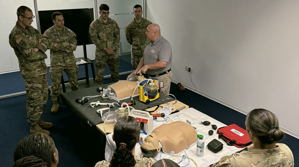 TILI instructor walking soldiers through airway and suction equipment